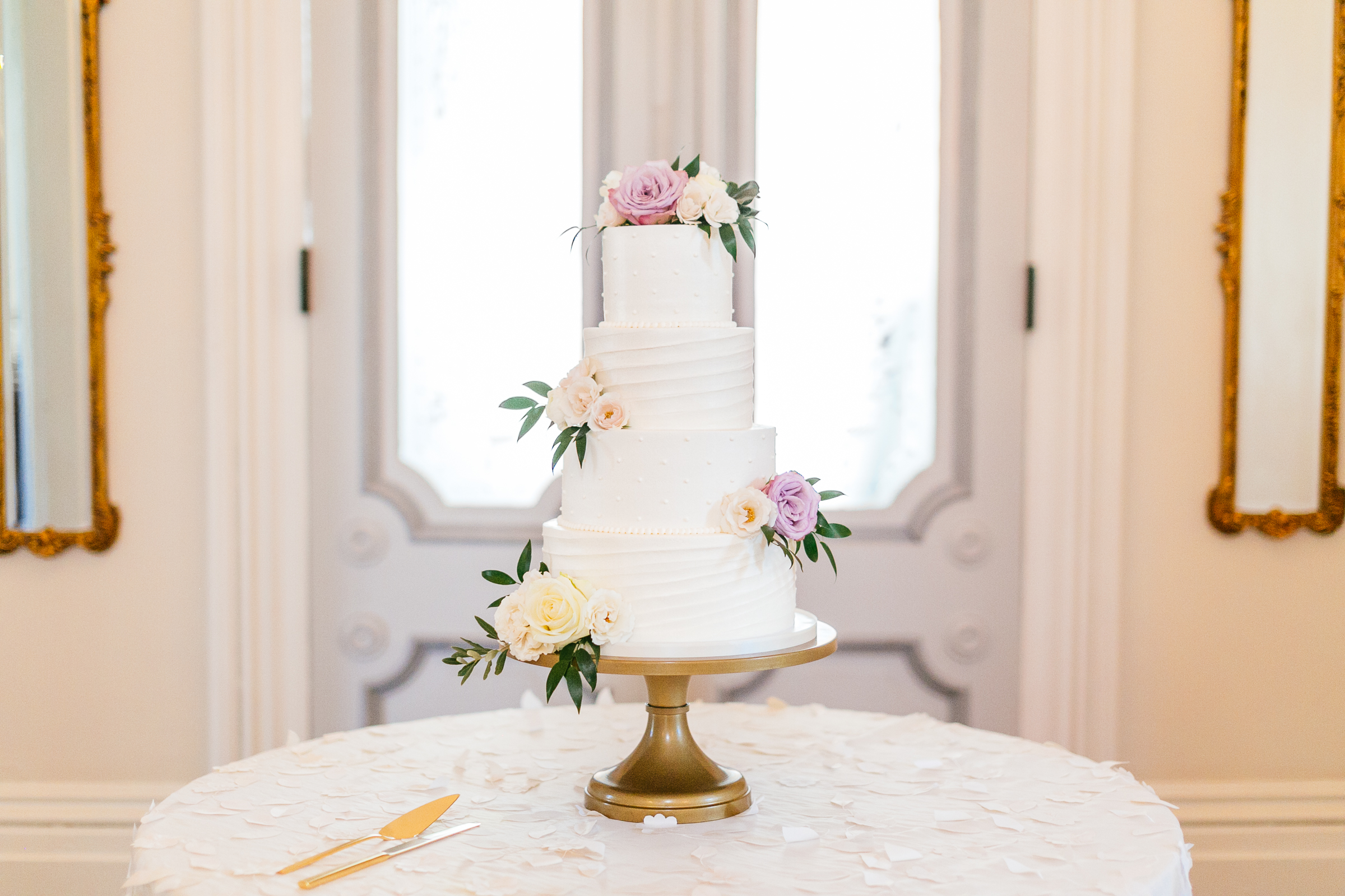 white buttercream wedding cake with pearls and texture at the Merrimon Wynne house